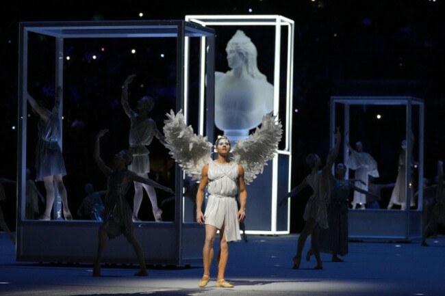 a-performer-prepares-for-the-start-of-the-olympic-opening-ceremony-at-the-2026-winter-olympics-in-milan-italy-friday-feb-6-2026-ap-photonatacha-pisarenko