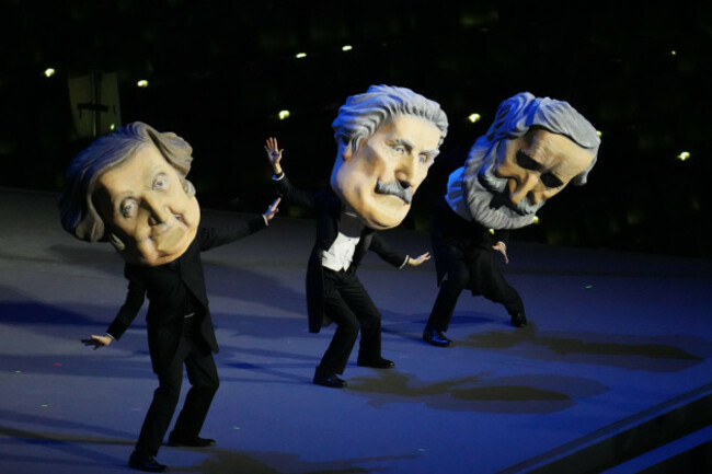 entertainers-perform-during-the-olympic-opening-ceremony-at-the-2026-winter-olympics-in-milan-italy-friday-feb-6-2026-ap-photoben-curtis