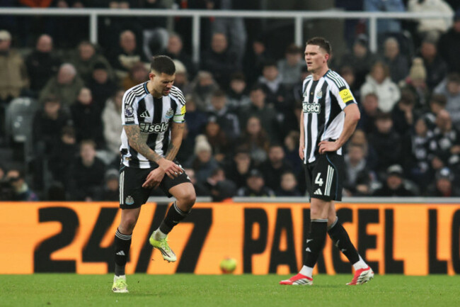 bruno-guimaraes-and-sven-botman-of-newcastle-united-show-dejection-following-brentfords-third-goal-during-the-premier-league-match-between-newcastle-united-and-brentford-at-st-jamess-park-newcastl