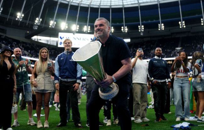 tottenham-hotspur-manager-ange-postecoglou-with-the-uefa-europa-league-trophy-on-the-pitch-after-the-premier-league-match-at-the-tottenham-hotspur-stadium-london-picture-date-sunday-may-25-2025