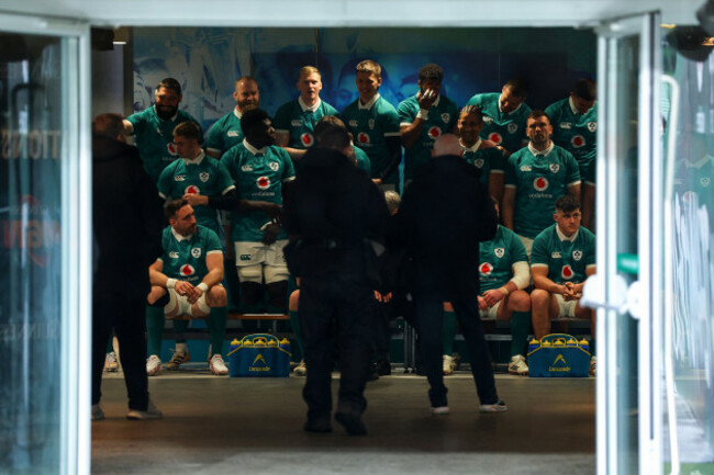 a-view-of-the-players-as-they-prepare-for-the-team-photo-being-taken-in-the-tunnel-due-to-poor-weather-conditions