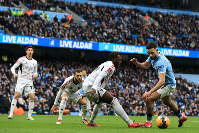 etihad-stadium-manchester-lancashire-uk-14th-feb-2026-fa-cup-football-manchester-city-versus-salford-city-rayan-ait-nouri-of-manchester-city-takes-on-rosaire-longelo-of-salford-city-credit-a