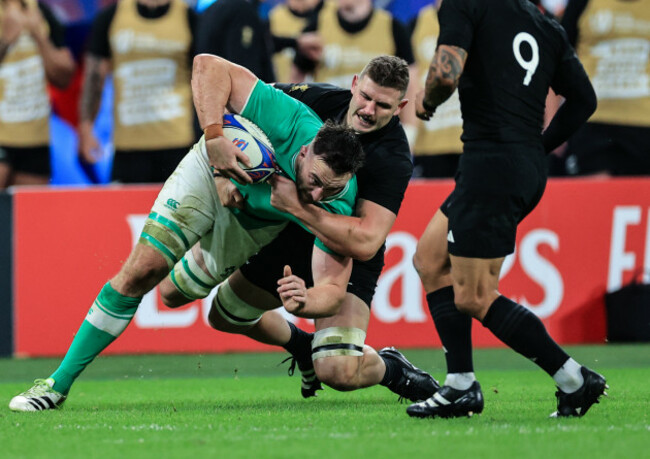 irelands-ronan-kelleher-is-tackled-by-all-blacks-dalton-papalii