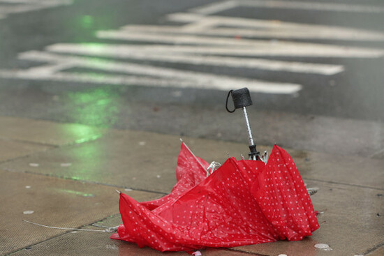 dublin-ireland-06th-february-2026-a-broken-umbrella-lies-discarded-on-a-footpath-on-a-dublin-street-during-a-period-of-wet-overcast-rainfall-in-the-irish-capital