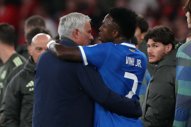 real-madrids-vinicius-junior-argues-with-benficas-head-coach-jose-mourinho-after-scoring-the-opening-goal-during-a-champions-league-playoff-soccer-match-between-sl-benfica-and-real-madrid-in-lisbon