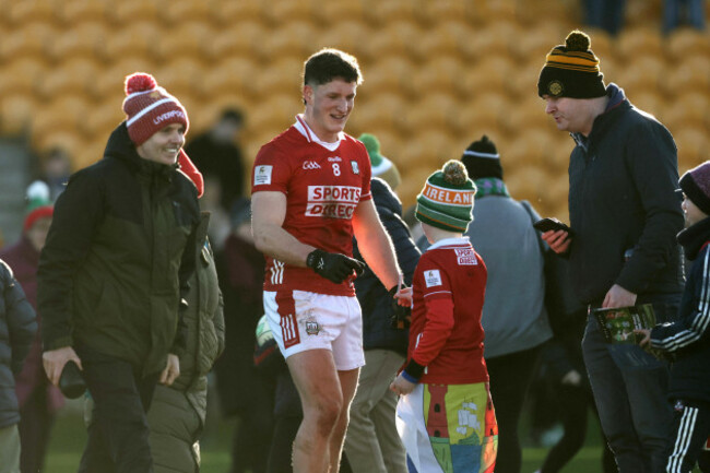 colm-ocallaghan-signs-an-autography-for-supporters-after-the-game