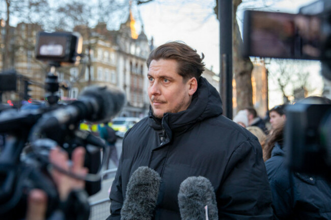 london-westminster-uk-3rd-jan-2026-joe-bennett-whose-mum-and-stepfather-have-been-imprisoned-in-iran-gives-a-tv-interview-during-a-vigil-outside-the-gates-of-downing-street-family-members-and-s