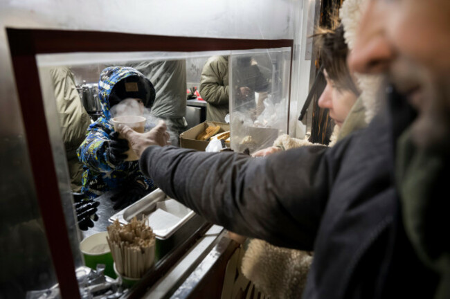 veterans-of-the-3rd-separate-assault-brigade-of-ukraines-armed-forces-serve-free-hot-meals-in-a-residential-neighborhood-for-people-without-power-in-their-homes-in-kyiv-ukraine-saturday-jan-31-2