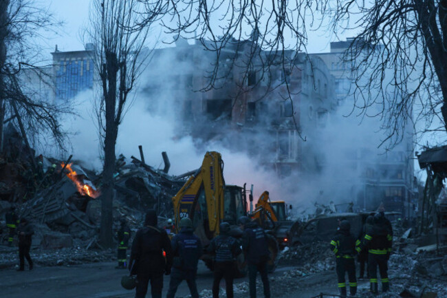 rescue-workers-carry-out-cleanup-operations-following-a-russian-missile-strike-on-a-residential-building-in-kyivskyi-district-of-kharkiv-ukraine-on-january-2-2026-the-attack-resulted-in-the-destru