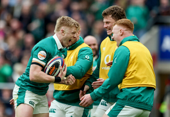 tommy-obrien-celebrates-with-cian-prendergast-and-ciaran-frawley-after-he-scores-his-sides-3rd-try-of-the-match