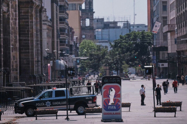 police-officers-stand-guard-in-downtown-guadalajara-jalisco-state-mexico-sunday-feb-22-2026-after-the-death-of-the-leader-of-the-jalisco-new-generation-cartel-nemesio-ruben-oseguera-cervantes