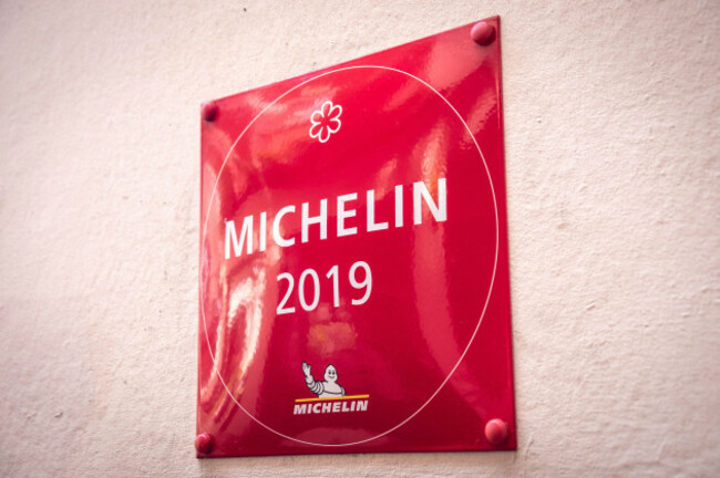 a-2019-michelin-star-award-displayed-outside-a-restaurant-in-londons-west-end