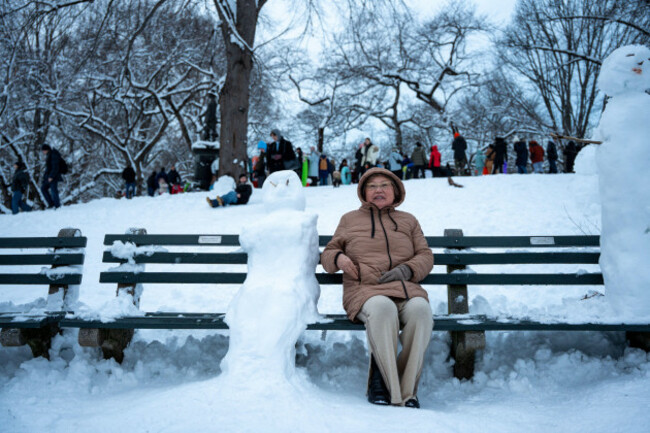 new-york-city-united-states-23rd-feb-2026-by-the-afternoon-as-the-blizzard-begins-to-ease-central-park-turns-into-a-vast-winter-playground-after-a-morning-of-heavy-snowfall-new-yorkers-head-ou