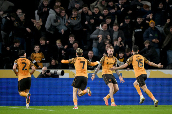 hull-citys-john-egan-right-celebrates-scoring-his-sides-third-goal-with-team-mates-during-the-sky-bet-championship-match-at-mkm-stadium-kingston-upon-hull-picture-date-tuesday-february-24-2026