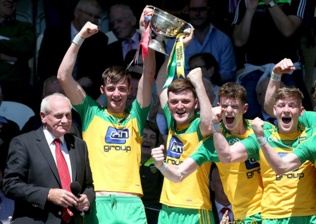 jason-mcgee-and-niall-odonnell-lift-the-cup