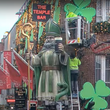 Temple Bar tourist trap pub installs giant St Patrick with a pint, then covers it with a bin bag