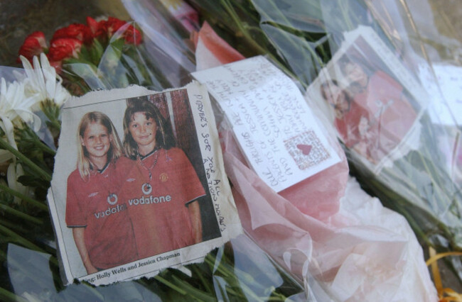 flowers-are-left-at-st-andrews-parish-church-in-the-town-of-soham-cambridgeshire-for-the-missing-10-year-olds-jessica-chapman-and-holly-wells-two-bodies-have-been-found-near-lakenheath