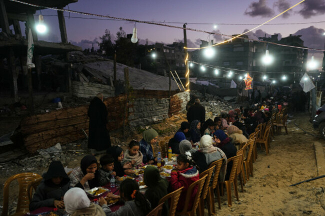 palestinians-gather-for-iftar-the-fast-breaking-meal-during-the-muslim-holy-month-of-ramadan-amid-the-rubble-of-destroyed-buildings-in-gaza-city-thursday-feb-26-2026-ap-photoabdel-kareem-hana