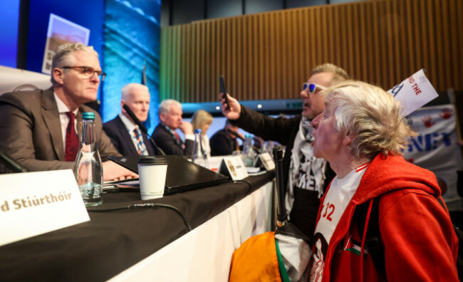 a-protester-confronts-gaa-president-jarlath-burns-during-the-2026-gaa-congress