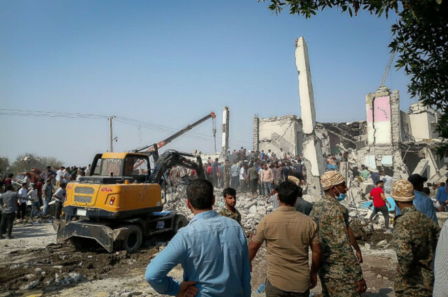 rescue-workers-and-residents-search-through-the-rubble-in-the-aftermath-of-an-israeli-u-s-strike-on-a-girls-elementary-school-in-minab-iran-saturday-feb-28-2026-isna-via-ap