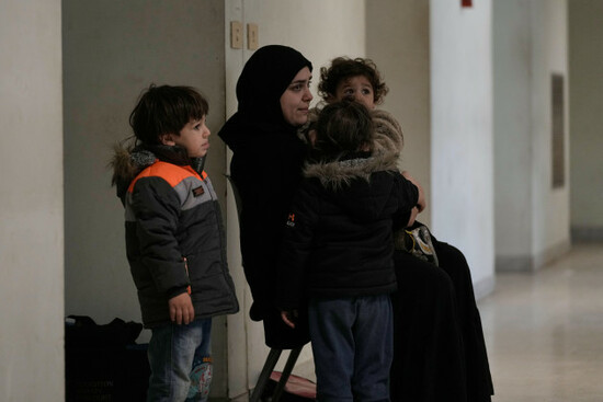 a-woman-with-her-children-who-fled-israeli-airstrikes-in-southern-lebanon-sits-at-a-school-turned-into-a-shelter-in-beirut-lebanon-on-monday-march-2-2026-ap-photobilal-hussein