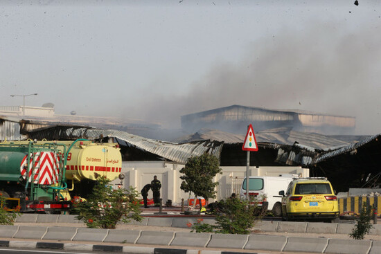 firefighters-work-as-smoke-rises-outside-a-damaged-warehouse-in-an-industrial-area-in-al-rayyan-qatar-following-an-iranian-strike-sunday-march-1-2026-ap-photo