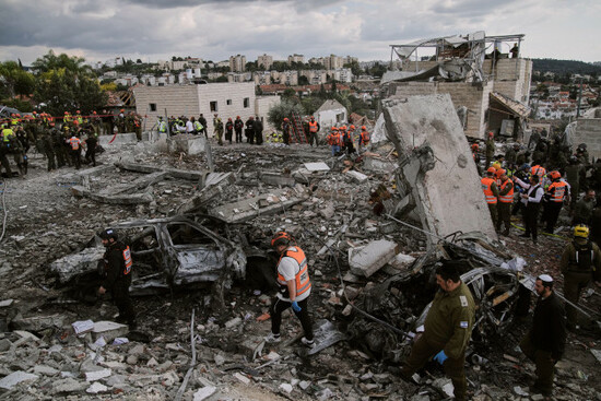 rescue-workers-and-military-personnel-operate-at-the-scene-where-several-people-were-killed-in-an-iranian-missile-strike-in-beit-shemesh-israel-sunday-march-1-2026-ap-photoleo-correa