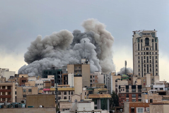 a-plume-of-smoke-rises-after-a-strike-in-tehran-iran-monday-march-2-2026-ap-photomohsen-ganji