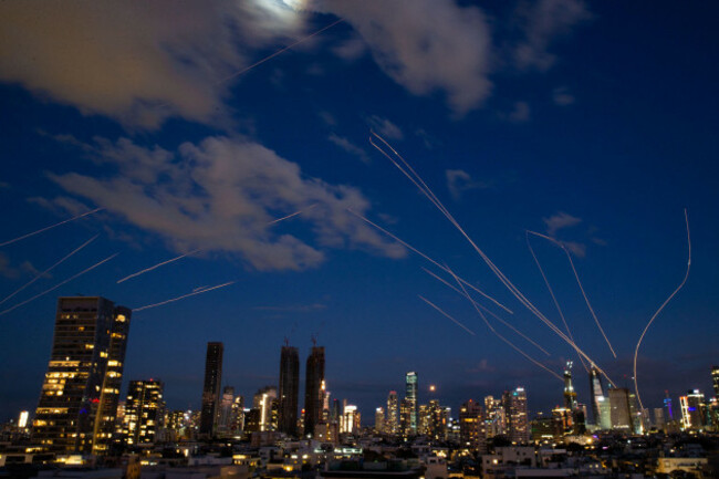 260301-tel-aviv-march-1-2026-xinhua-this-long-exposure-photo-taken-on-feb-28-2026-shows-flare-trails-of-the-interceptor-missiles-launched-from-israeli-air-defense-systems-in-tel-aviv-is