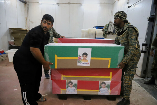 coffins-holding-the-bodies-of-mostly-children-are-prepared-for-the-funeral-of-those-killed-in-what-iranian-officials-said-was-an-israeli-u-s-strike-feb-28-at-a-girls-elementary-school-in-minab-ira