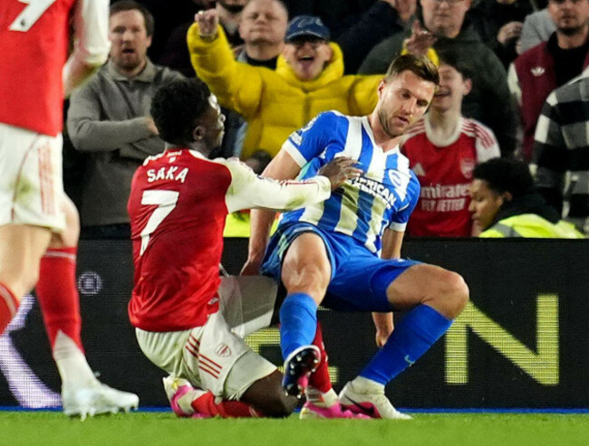 arsenals-bukayo-saka-pushes-over-brighton-and-hove-albions-joel-veltman-during-the-premier-league-match-at-the-american-express-stadium-brighton-picture-date-wednesday-march-4-2026