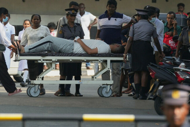 an-iranian-sailor-who-was-rescued-from-iris-dena-warship-by-sri-lankas-navy-is-transported-on-a-gurney-to-a-judicial-medical-officer-from-the-national-hospital-in-galle-sri-lanka-thursday-march