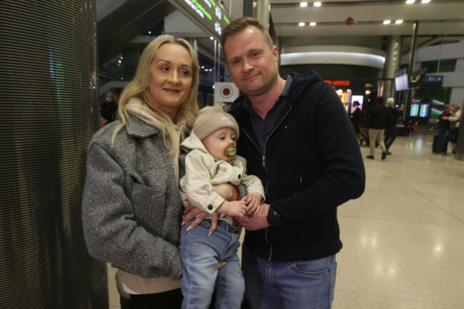 jakub-kuba-sieniawska-is-greeted-him-by-his-wife-kasia-sieniawska-and-their-1-year-old-son-kyle-as-he-arrives-at-dublin-airport-on-a-flight-from-dubai-in-the-united-arab-emirates-many-people-have