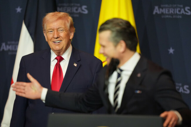 president-donald-trump-listens-while-defense-secretary-pete-hegseth-speaks-at-the-shield-of-the-americas-summit-saturday-march-7-2026-at-trump-national-doral-miami-in-doral-fla-ap-photorebecca