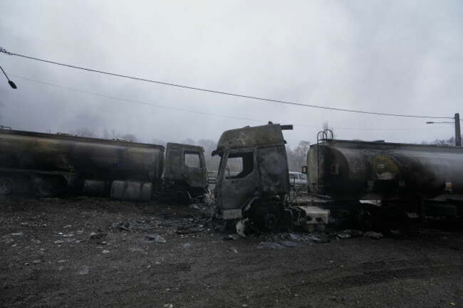 two-burned-oil-tanker-trucks-sit-near-an-oil-storage-facility-hit-in-a-u-s-israeli-strike-late-saturday-in-tehran-iran-sunday-march-8-2026-ap-photovahid-salemi