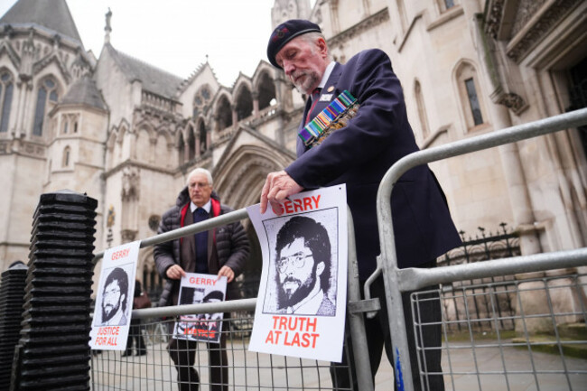 british-military-veterans-hanging-placards-outside-the-royal-courts-of-justice-in-central-london-where-a-civil-claim-is-being-brought-against-former-sinn-fein-president-gerry-adams-for-just-1-in-dam