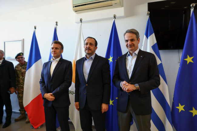 french-president-emmanuel-macron-left-meets-cypriot-president-nikos-christodoulides-center-and-greek-prime-minister-kyriakos-mitsotakis-in-paphos-cyprus-monday-march-9-2026-gonzalo-fuentespo