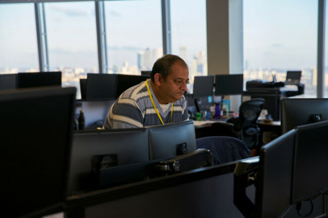businessman-working-at-computer-in-office