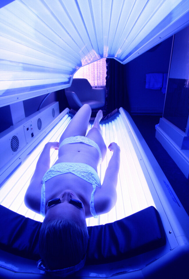 health-beauty-girl-tanning-on-salon-sunbed