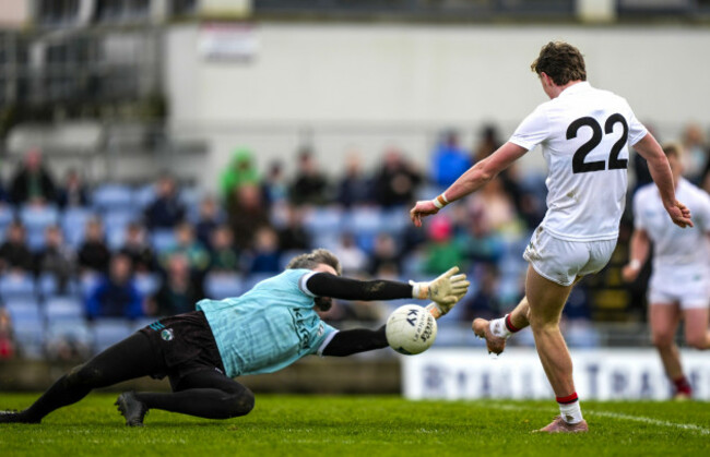 shane-brophy-saves-a-shot-from-kobe-mcdonald