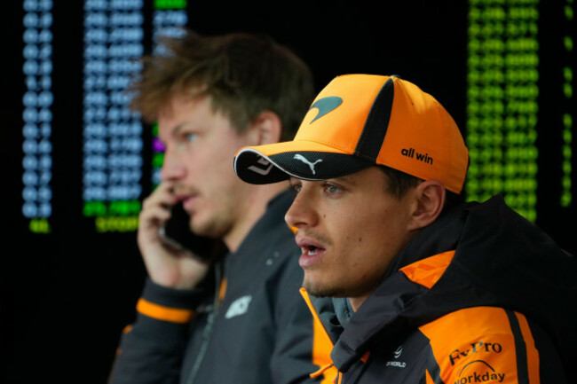 mclaren-driver-lando-norris-of-britain-watches-the-chinese-formula-one-grand-prix-race-at-the-shanghai-international-circuit-in-shanghai-china-sunday-march-15-2026-ap-photovincent-thian