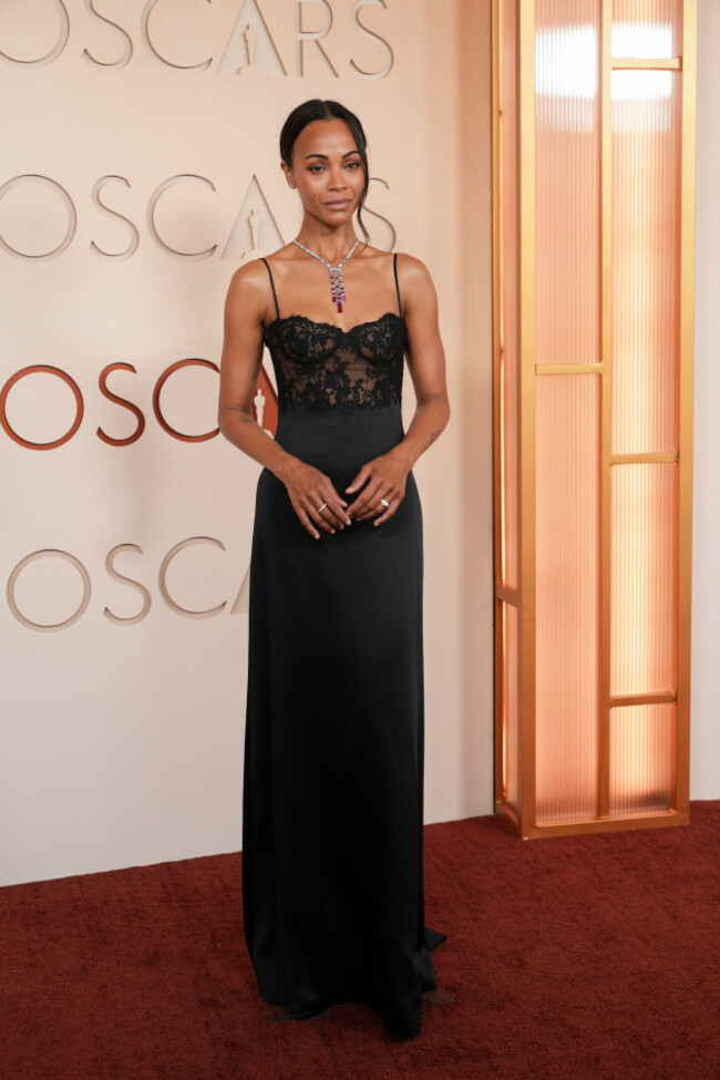 zoe-saldana-arrives-at-the-oscars-on-sunday-march-15-2026-at-the-dolby-theatre-in-los-angeles-ap-photogregory-bull
