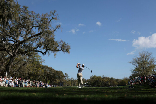 ponte-vedra-beach-fl-march-15-rory-mcilroy-of-northern-ireland-plays-a-tee-shot-on-the-12th-hole-during-the-players-championship-on-march-15-2026-at-tpc-sawgrass-in-ponte-vedra-beach-fl-photo