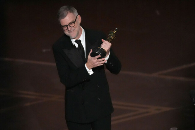 paul-thomas-anderson-accepts-the-award-for-directing-for-one-battle-after-another-during-the-oscars-on-sunday-march-15-2026-at-the-dolby-theatre-in-los-angeles-ap-photochris-pizzello