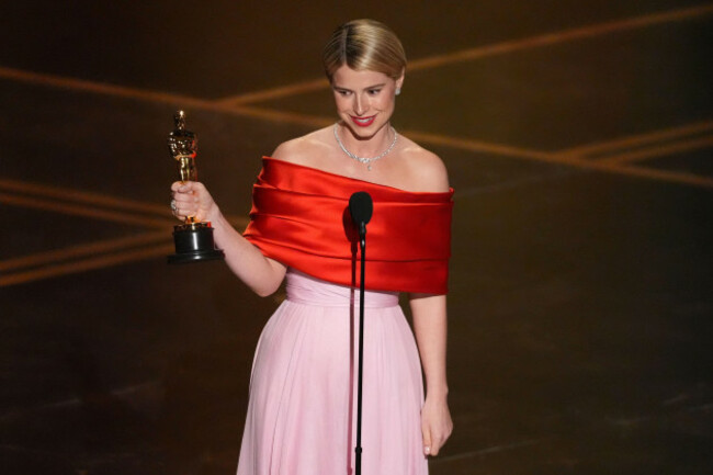 jessie-buckley-accepts-the-award-for-actress-in-a-leading-role-for-hamnet-during-the-oscars-on-sunday-march-15-2026-at-the-dolby-theatre-in-los-angeles-ap-photochris-pizzello