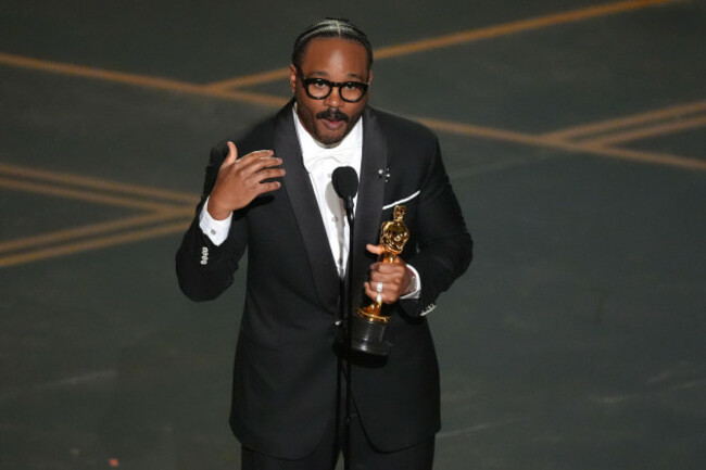 ryan-coogler-accepts-the-award-for-writing-original-screenplay-for-sinners-during-the-oscars-on-sunday-march-15-2026-at-the-dolby-theatre-in-los-angeles-ap-photochris-pizzello