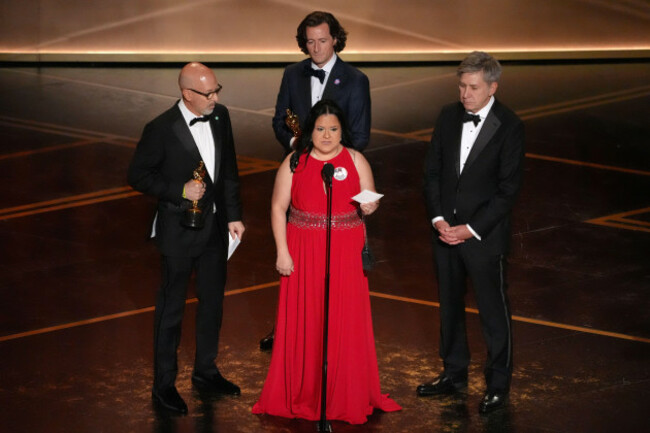 joshua-seftel-from-left-gloria-cazares-conall-jones-and-steve-hartman-accept-the-award-for-documentary-short-film-for-all-the-empty-rooms-during-the-oscars-on-sunday-march-15-2026-at-the-dolb