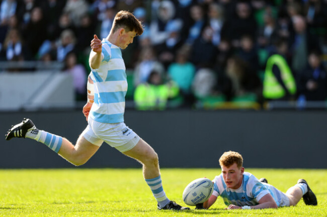 luke-coffey-takes-a-kick-with-paddy-scally-in-the-windy-weather-conditions