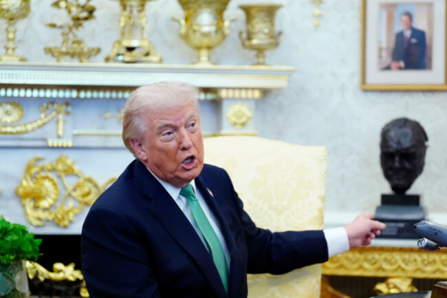 president-donald-trump-points-to-a-bust-of-winston-churchill-as-he-speaks-during-a-meeting-with-irish-prime-minister-micheal-martin-in-the-oval-office-of-the-white-house-on-st-patricks-day-tuesday