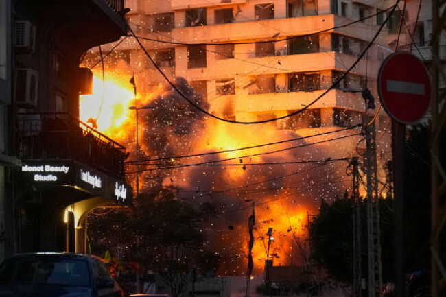 an-explosion-erupts-from-a-building-following-an-israeli-strike-in-central-beirut-lebanon-wednesday-march-18-2026-ap-photohussein-malla